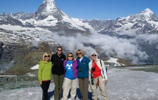 Women hiking beneath the Matterhorn in Switzerland