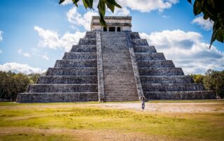 The ancient ruin of the Mayan pyramid of Kukulkan, in the Mayan city of Chichen Itza in Piste (Mexico), this city is a monumental symbol of the prehispanic civilization of the Mayas.