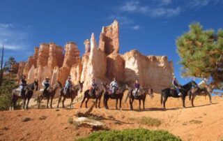 Women riding mules in small groups with Canyon Calling tours to Bryce Canyon, Utah