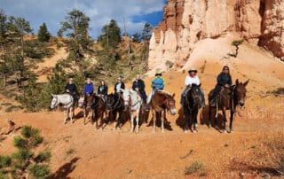 Women horseback riding through Bryce Canyon on women-only trip to Utah