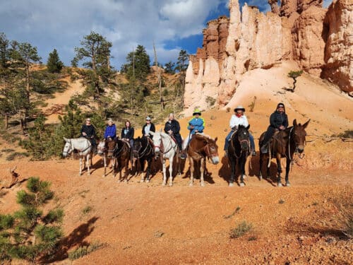 Women horseback riding through Bryce Canyon on women-only trip to Utah