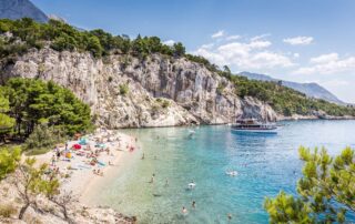 Relax with fellow women travelers on one of Croatia's many beaches - Canyon Calling adventure trips for women only