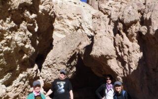 Women exploring the desert together in small groups with Canyon Calling