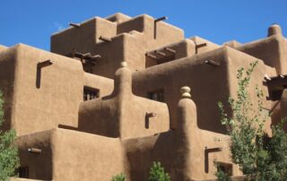 View traditional adobe architecture and dwellings in New Mexico trip for women