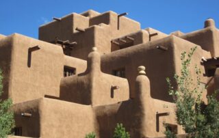 View traditional adobe architecture and dwellings in New Mexico trip for women
