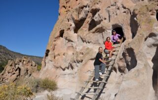 Women exploring ruins in small groups with Canyon Calling