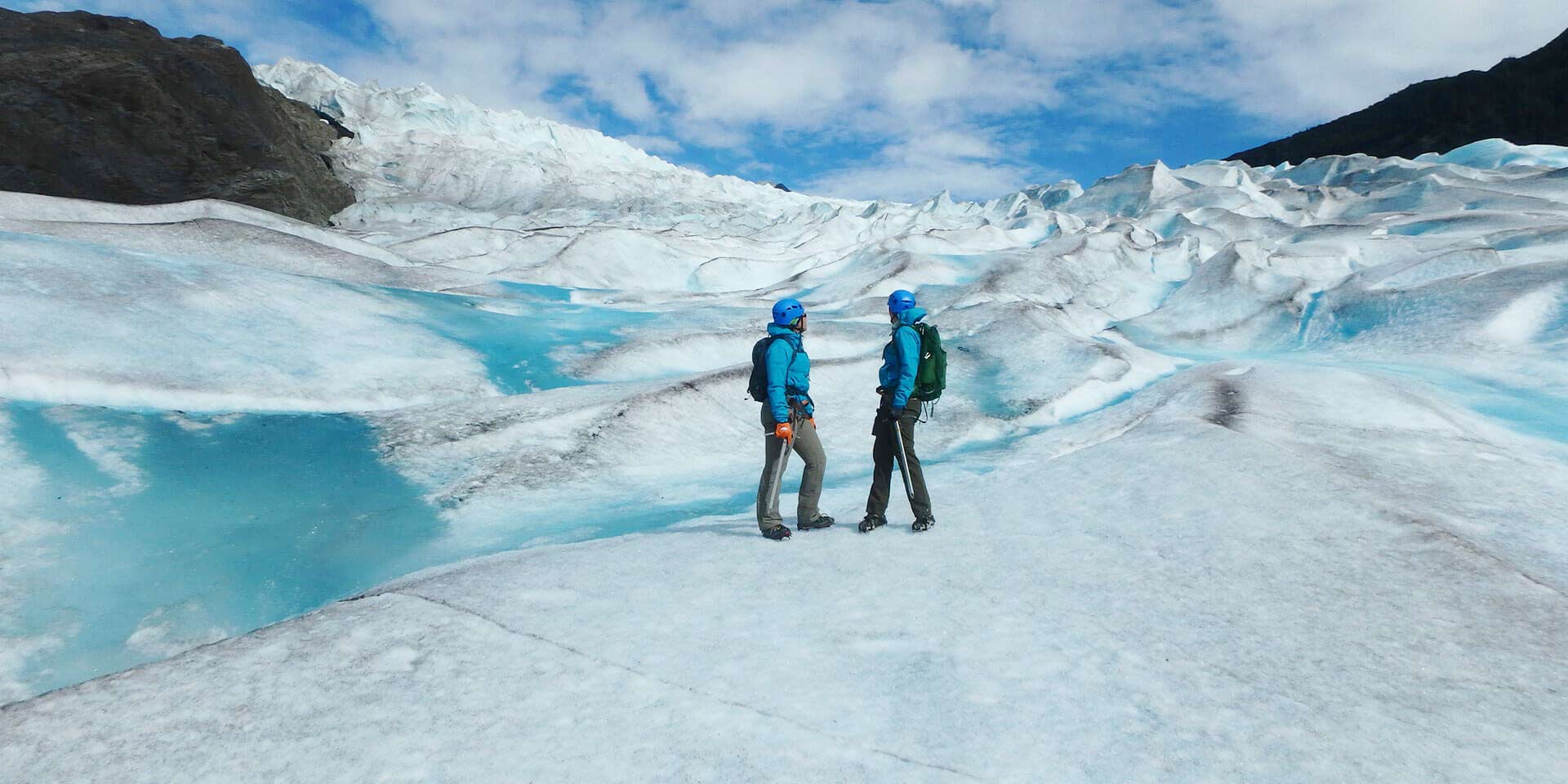 Trekking through ice with fellow women travelers and Canyon Calling Adventures