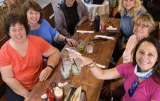 Women sipping margaritas on a tour of Key West, Florida with Canyon Calling Adventures