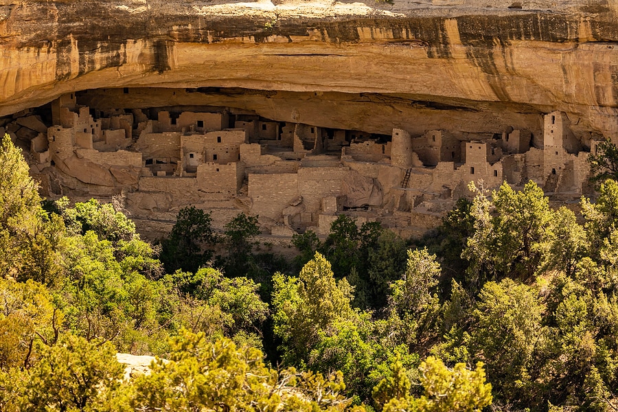 Desert Mountain Escape Adventure Trip to New Mexico & Colorado! Photo: Spruce Tree House tucked under canyon cliffs in Mesa Verde National Park.