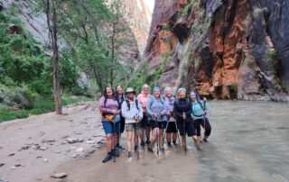 Dip your feet in the Narrows in Zion National Park with fellow women travelers and Canyon Calling