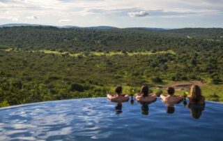 Soak in luxury accommodations with fellow women travelers on your next getaway to Uganda
