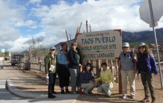 Visit the Taos Pueblo World Heritage Site with fellow women travelers and Canyon Calling