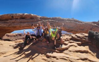 Hiking to the Mesa Arch in Canyonlands National Park with Canyon Calling - small group tours for women only