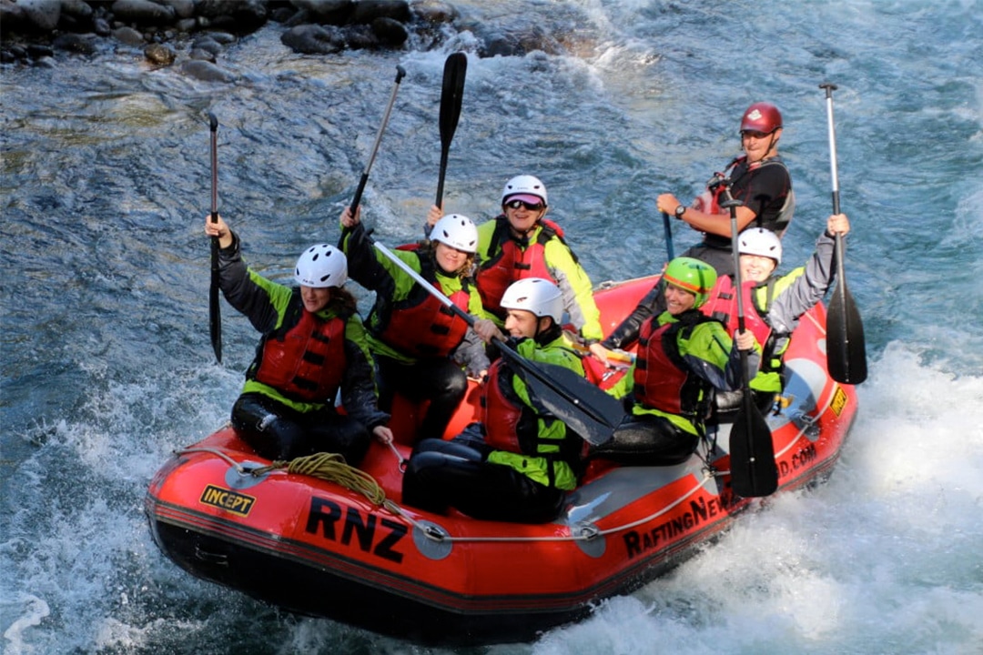 Private Adventure Travel Tours to New Zealand for Women Only! Image - women white water rafting