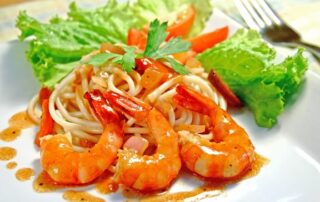 Delicious plate of pasta with prawns