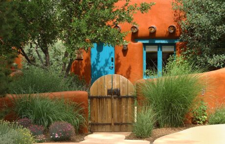 Orange adobe Santa Fe cottage - Northern New Mexico Adventure Tours
