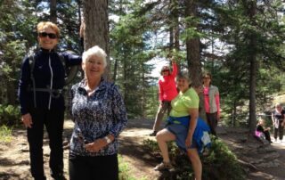 Women hiking together in small groups in British Columbia