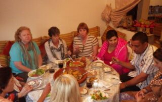 Women enjoying Moroccan cuisine with Canyon Calling Adventures