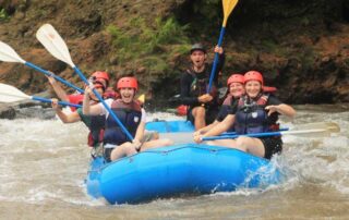 Women having a blast rafting the French Broad River in Asheville, NC