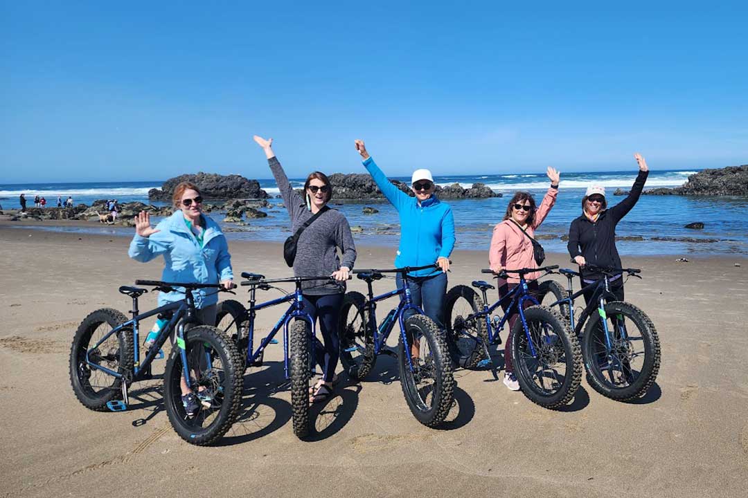 Fat tire biking on the beaches of Oregon with Canyon Calling's small group tours for women only
