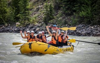 Adventure Travel in the Canadian Rockies! Photo: Women river rafting