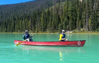 Canoe Emerald Lake with fellow women travelers - Canadian Rockies getaways