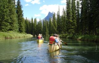 Women canoeing on Emerald Lake, Canada with Canyon Calling Adventures