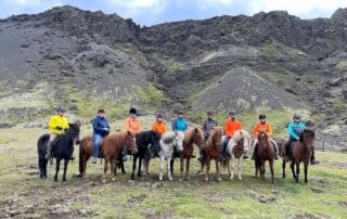 Women horseback riding together in Iceland