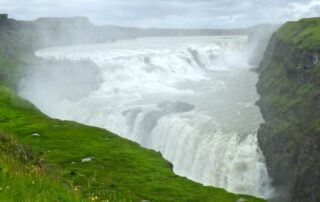 Travelling adventures for women to Iceland: Explore majestic waterfalls and emerald landscapes.
