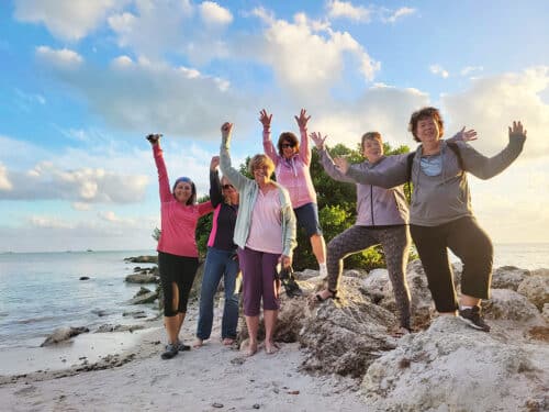 Women having a blast walking the beaches of Key West