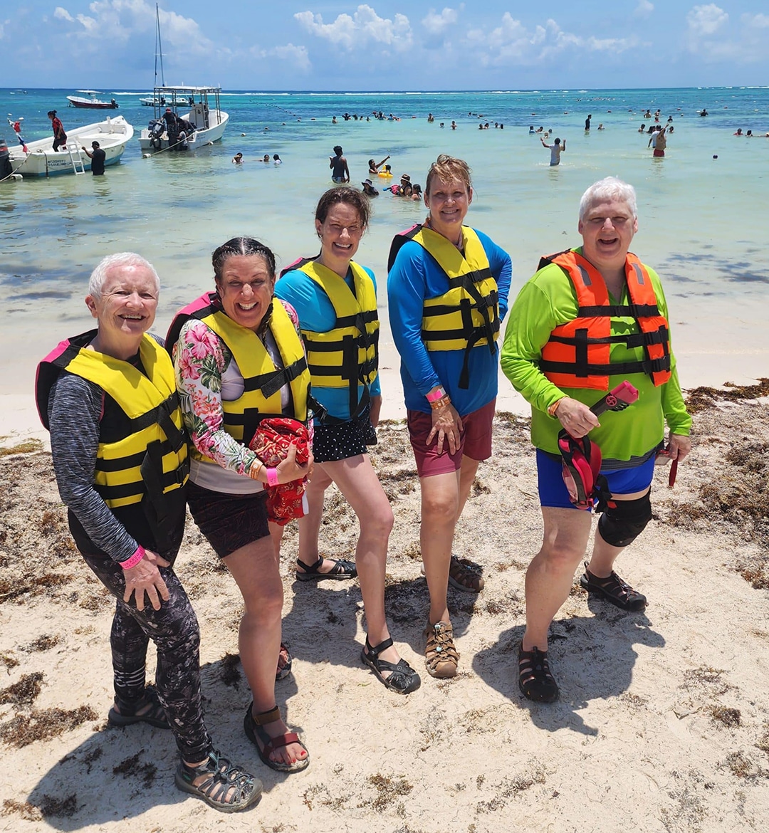 Women about to enjoy a dip in the crystal blue waters of the Yucatan Peninsula