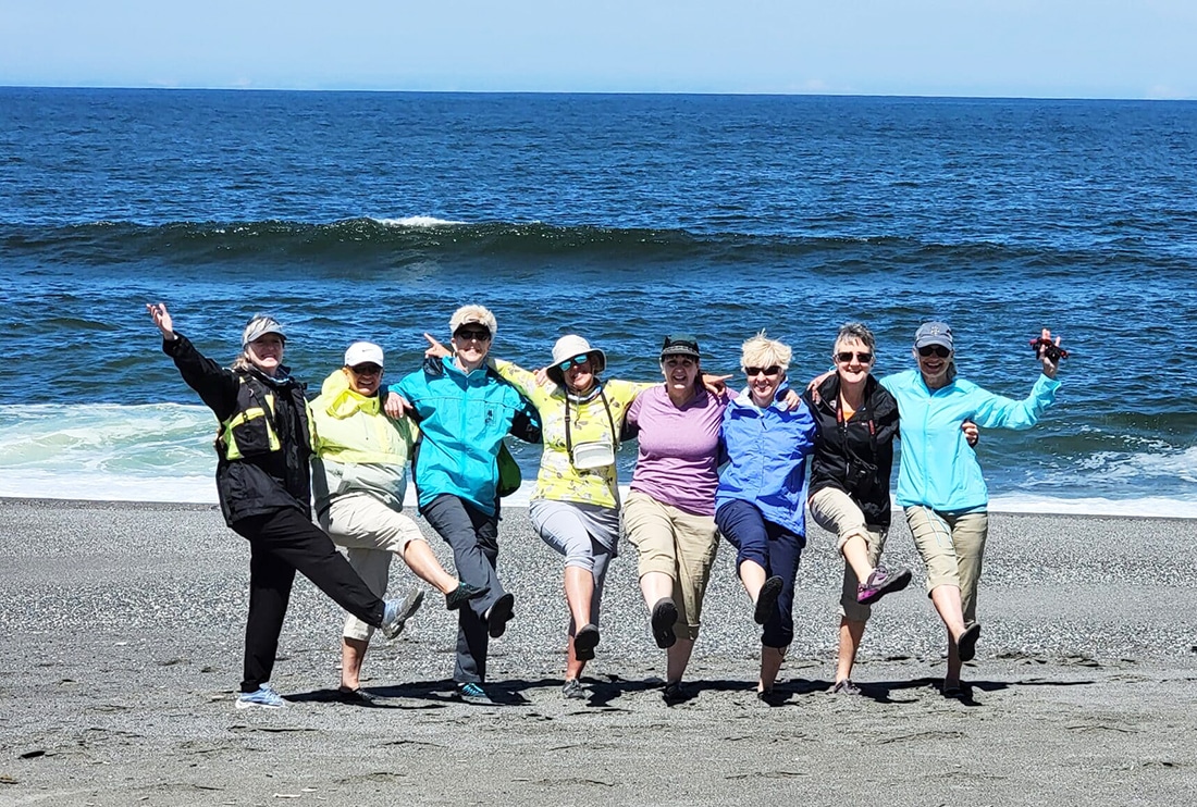 Women having a blast enjoying the beaches of Oregon