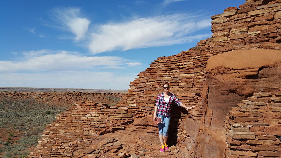 Women visiting Wupatki National Monument with Canyon Calling