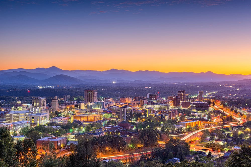 View of Asheville's downtown skyline- small group tours for women only with Canyon Calling