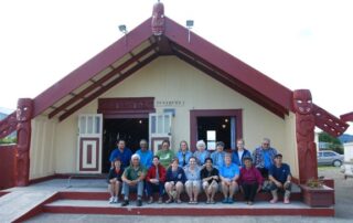 Women visiting the Maraes of New Zealand with Canyon Calling Adventures