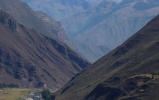 Scenic view of the Peruvian Andes: Explore the white capped mountains and deep valleys of South America