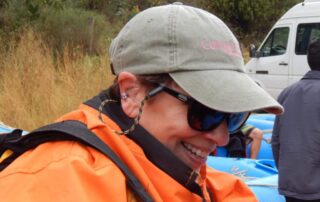 Smiling woman travelling the Peruvian Andes on a gal's vacation with Canyon Calling