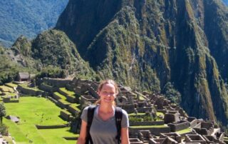 Woman visiting Machu Picchu and Aguas Calientes, Peru