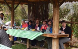 Women taking a snack break in Peru