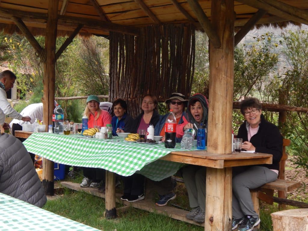 Women taking a snack break in Peru