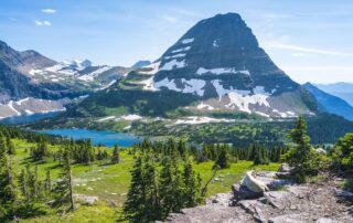 Scenic view of snow speckled Glacier National Park - Montana tours for women-only