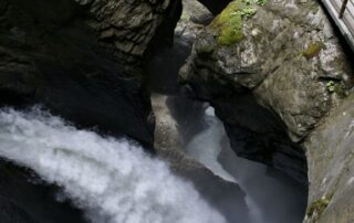 Visit a glacier waterfall inside a mountain in Trummelbach, Switzerland