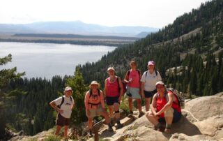 Women hiking in small groups through the National Parks of Wyoming with Canyon Calling