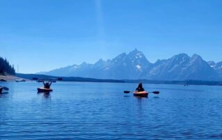 Women kayaking adventures to Jackson Lake, WY