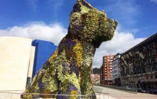 Spain - Bilba floral dog sculpture photography trips for women traveling together in Europe